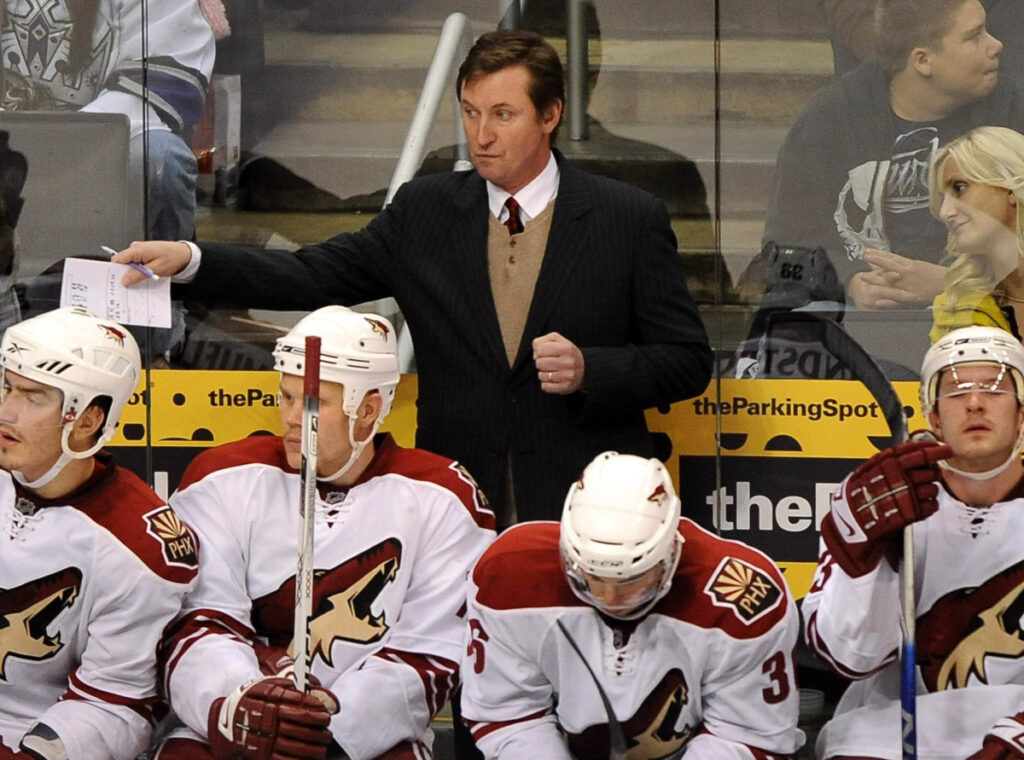 Wayne Gretzky coaching the Arizona Coyotes after retiring as a hockey player