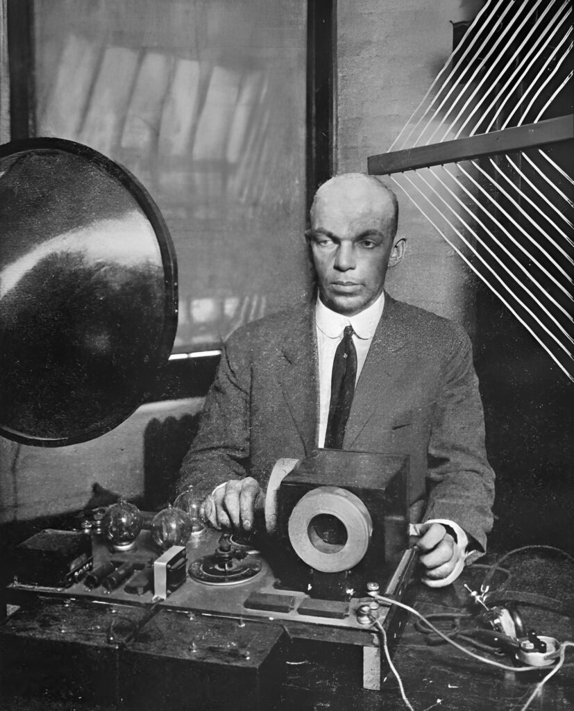 Edwin Armstrong with an early radio receiver prototype