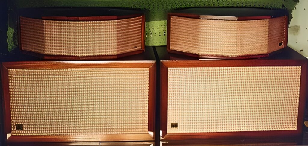 A pair of JansZen 1-30 electrostatic tweeters sitting atop a pair of Acoustic Research AR-1 speakers