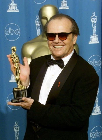 Jack Nicholson holding an Oscar award