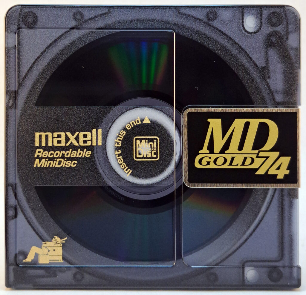 A Maxell Gold recordable MiniDisc with 74 minutes of recording time
